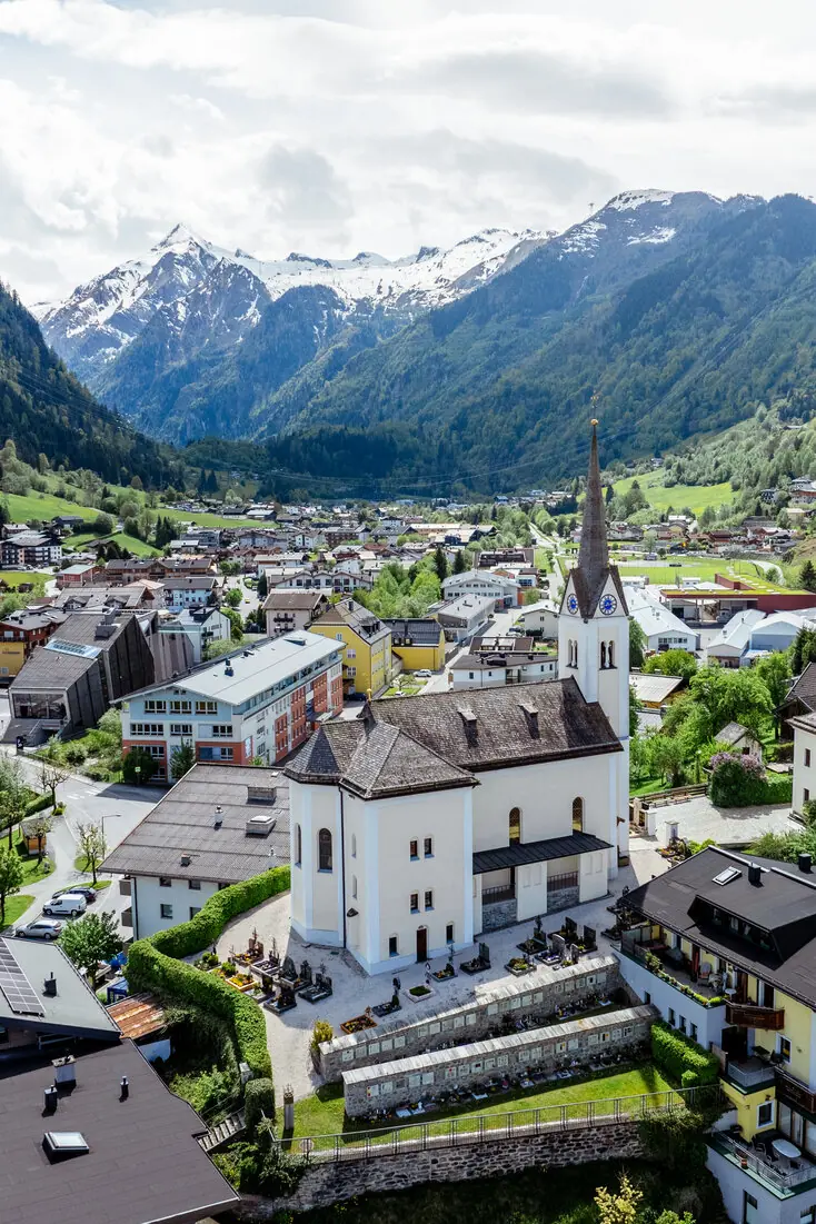 Aerial view of Kaprun town centre with the Kitzsteinhorn in the background